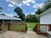 Back deck leads out to the yard.