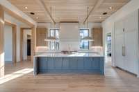 View of your Dream Kitchen with 12' ceiling, Oversized island and Luxury Appliances