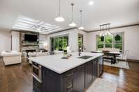 The oversized kitchen island offers an abundance of space.