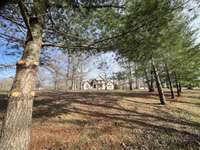 A view of this luxury property upon entering the driveway.