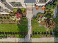 Extensive landscape and hardscape surrounding the home.