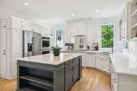 Beautiful custom kitchen with all stainless appliances. Custom cabinets by McDonald Cabinetry.