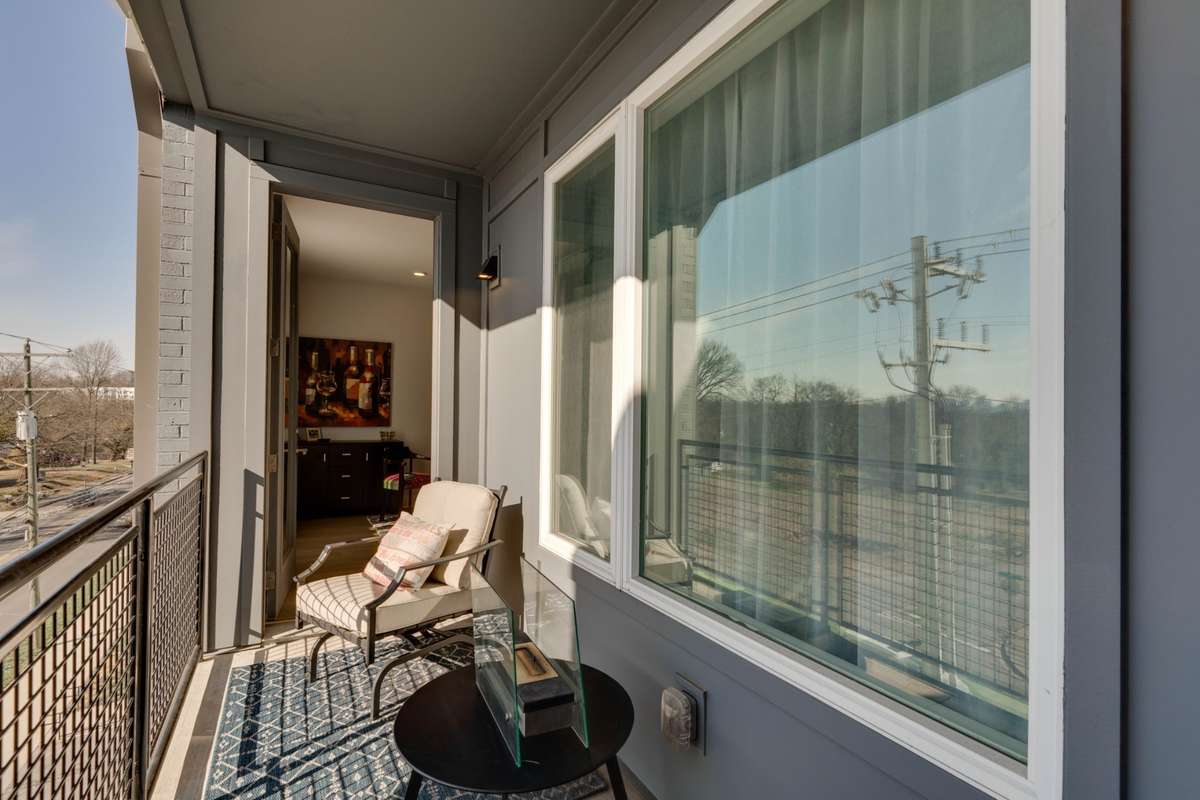 Door from Living Room leading to the private balcony