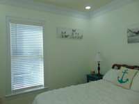 Bedroom #3 in the SW corner of the home with cedar lined closet.