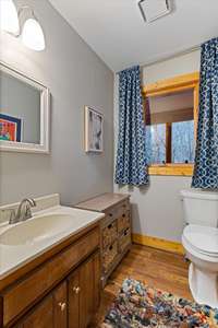 This half bath is located between bedrooms 2 and 3.