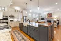 Kitchen Remodel with honed granite countertops, farm sink, and overlay cabinets