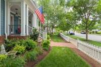 Lush landscaping in the front on a boulevard street