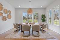 Spacious dining overlooks back yard