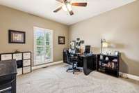 Bedroom 2 features carpeted flooring, a single window for natural light, and a ceiling fan for comfort. 3128 Landview Dr.   Murfreesboro, TN 37128