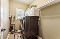 The utility room features a drying rack, a small window, tile flooring, and cabinets for neat storage. 3128 Landview Dr.   Murfreesboro, TN 37128