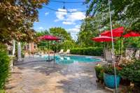 Stamped concrete pool deck just power-washed and sealed July 2024