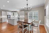 With an eat-in area and bar seating, there is enough room in this kitchen for all your friends and family to gather.