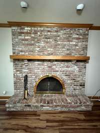 Woodburning fireplace that could be switched over to gas if you prefer.