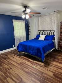 Bdrm #5 Bedroom has full bath with walk in closet, new LVP flooring throughout.