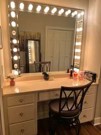 Vanity inside of dressing area located in the Primary Suite.