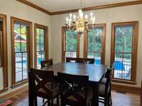 Breakfast nook- right off the kitchen, overlooking the pool.