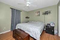 Master bedroom - laminate flooring, ceiling fan