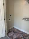 The washer & dryer will remain in this laundry area.  Love the flooring!