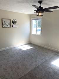 This spacious bedroom has great closet space, neutral paint & carpet!