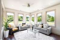 Beautiful sun room! What a great spot to relax.