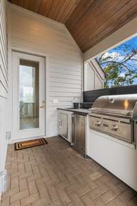 Outdoor kitchen area for rooftop patio