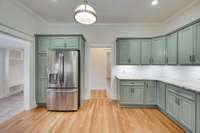 Loads of countertop and cabinet space in this kitchen.