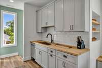 Ample cabinet, countertop space make this a very functional kitchen.