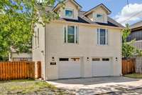 View of garage entry from alley way behind property.