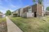 Nice outside area with sidewalk between the rear buildings.