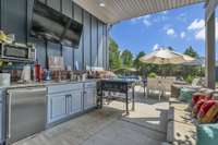 Outdoor kitchen with hot and cold water for all your cooking and preparing needs.