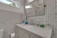 Custom tile work in this bathroom as well.