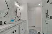 1st Primary Bathroom with granite and double sinks.