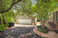 This property also features a rare two car garage, strategically tucked away behind the home, just off the mud room.