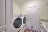 Washer and dryer to convey with home.  Seller had an extra access point from the owners closet installed to get to the water turn-off so that you don't have to climb on the machines or move them if you don't want/need to.