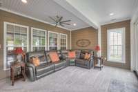 New carpet and ceiling fan for added enjoyment of sunroom