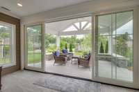 Sunroom opens to covered patio