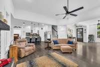 Enormous Gathering Room for family that leads into dining room or kitchen..  Beautiful Tennessee Limestone Hearth and mantel are the focal point of this room.