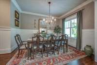 Beautiful Aidan Gray Villa Lantre Chandelier and T&G Wainscoting with chair rail