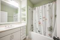 En-Suite Bath on Bed #4 Tiled Shower and Travertine countertop