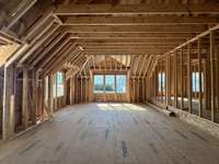 Huge Game Room and Bonus Room with Wet Bar.  *this home is under construction.  Photo Taken 8/15/24