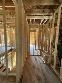 Bath #5 with walk-in shower and bench.  *this home is under construction  Photo Taken 8/15/24