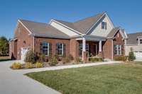 Side view of your new home with a covered front porch.