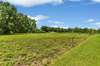 This property spans 2.06 acres in Woodbury, providing ample space for various outdoor activities.   787 Finnie Simmons Rd  Woodbury, TN  37190