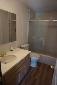 Bathroom 1 includes a single vanity and a shower with a sliding glass door! 787 Finnie Simmons Rd  Woodbury, TN  37190