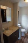 Bathroom 2 is equipped with a single vanity and a combination shower and tub. 787 Finnie Simmons Rd  Woodbury, TN  37190