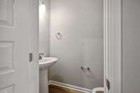 Half-Bath located on the Main Level. 5-panel doors are another Standard Feature in Horizon Homes.