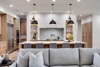 What a stunning kitchen with a huge central island.