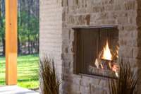 An outdoor fireplace! What a bonus.
