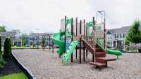 Large Playground located just steps away in front of the townhome