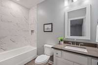 Full Bathroom on Second Floor with Tub Tile Surround